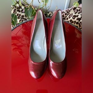 Calvin Klein patent leather platform pumps. has some markings shown in photos
